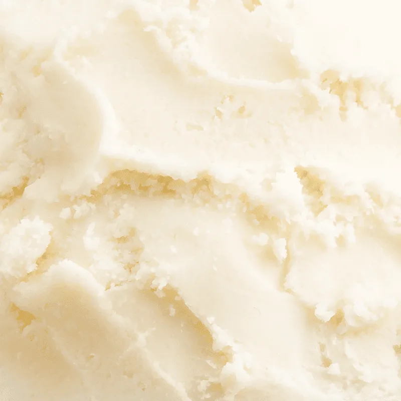 Close-up of the creamy texture of shea butter.